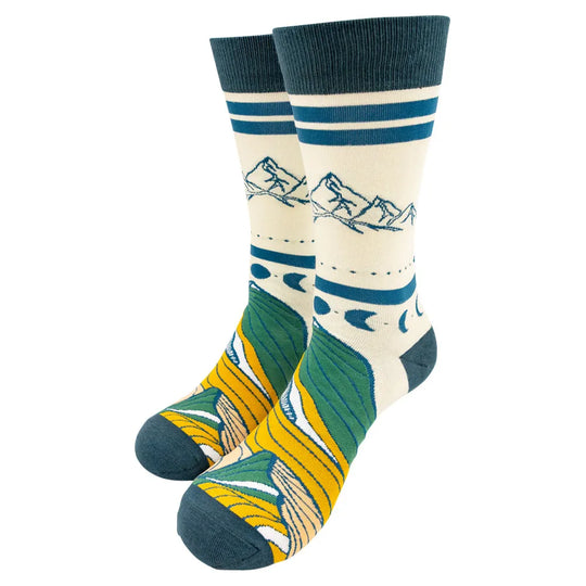 Colorful socks with mountain design on a white background