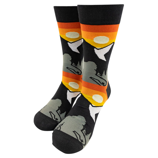 Mountain Sunset Bigfoot Knit Socks featuring a colorful nature design with black heels and toes on a white background