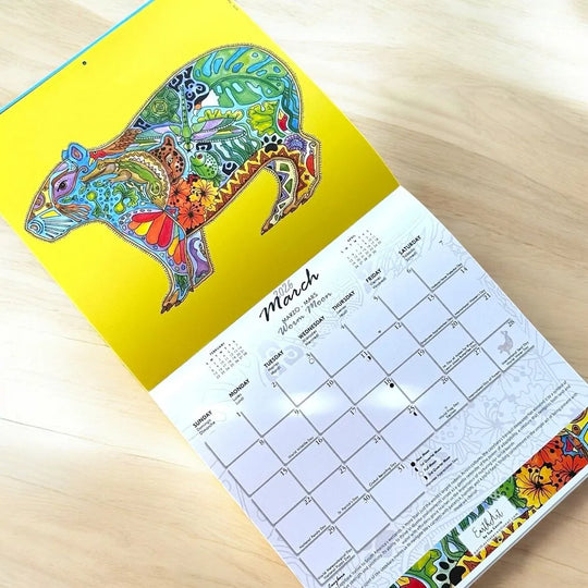 Calendar with a colorful capybara design on a yellow background