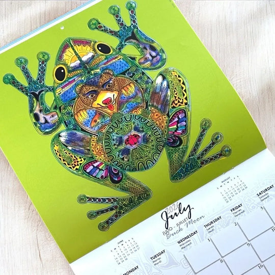 Colorful frog design on a calendar with a green background