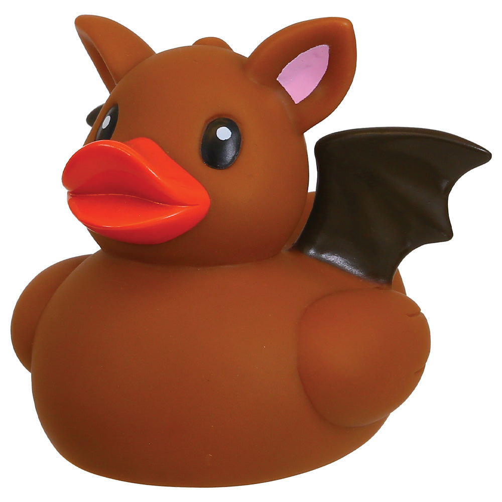 A brown rubber duck toy with bat features, including a black wing, pink inner ear, and a bright orange beak, isolated on a white background.