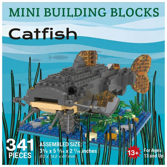 Box-style product graphic for a mini building blocks catfish set. The central image shows a gray and black assembled catfish model with translucent gold-orange fins and a blue base, surrounded by illustrated seaweed on a blue underwater background.