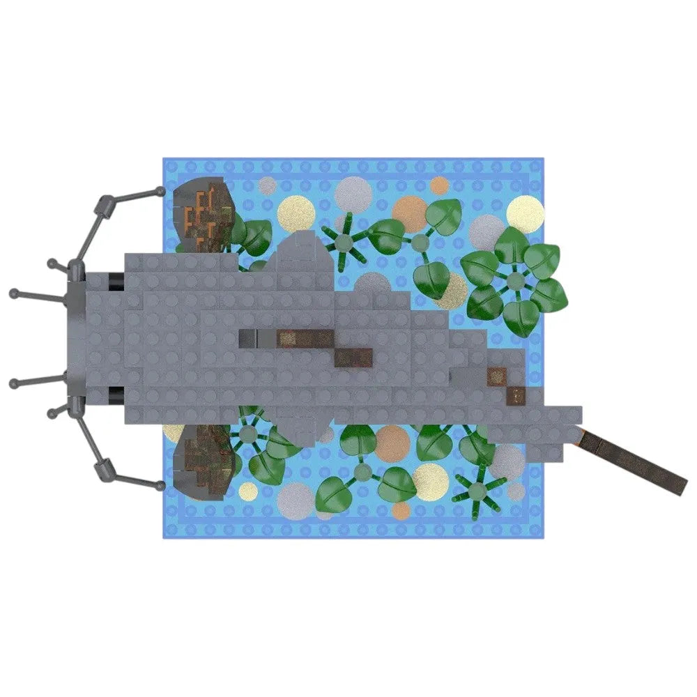Top view of a toy catfish made from interlocking building blocks on a white background