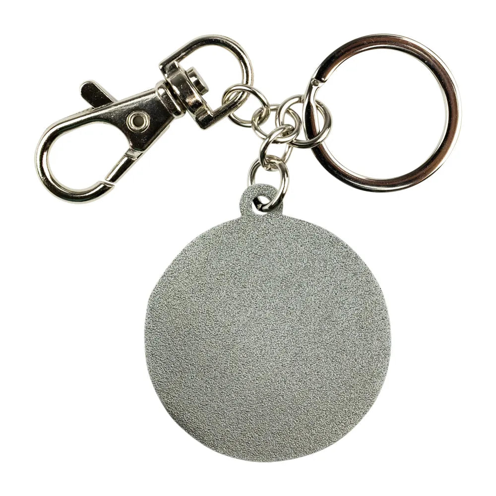 A blank silver metal keychain featuring a round textured disc charm, attached to a split key ring and a lobster clasp, shown on a plain white background.