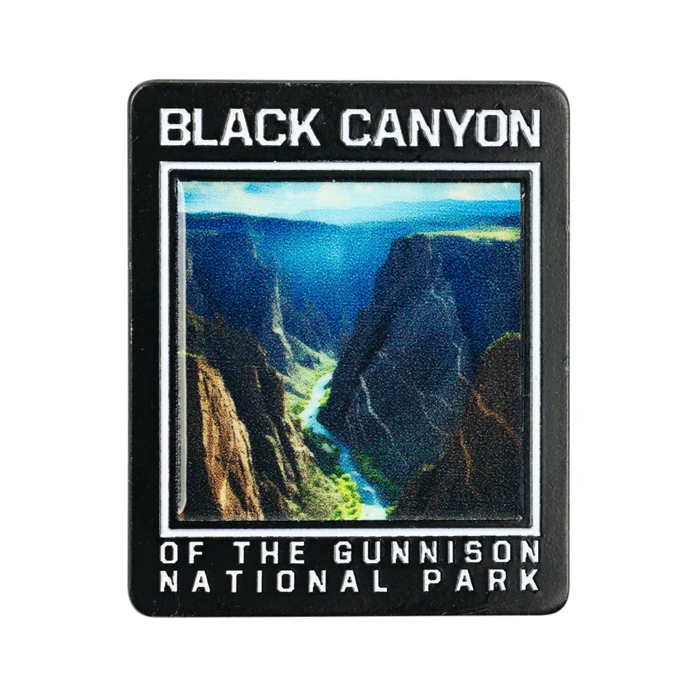 A square black pin featuring a scenic photograph of Black Canyon of the Gunnison National Park, with white text reading &
