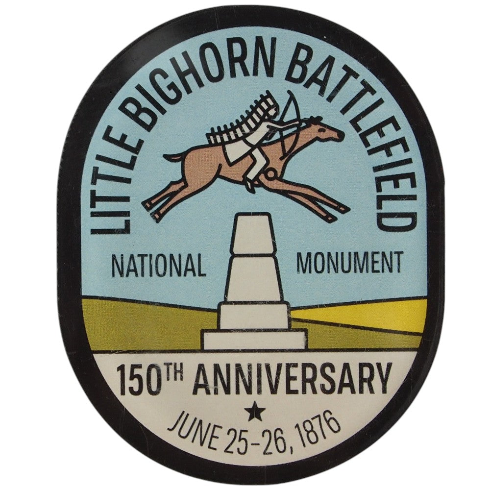 Oval acrylic magnet for Little Bighorn Battlefield National Monument with a horse and monument illustration.