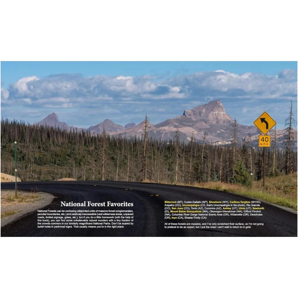 Scenic road with mountains and a sign in the National Forest Favorites