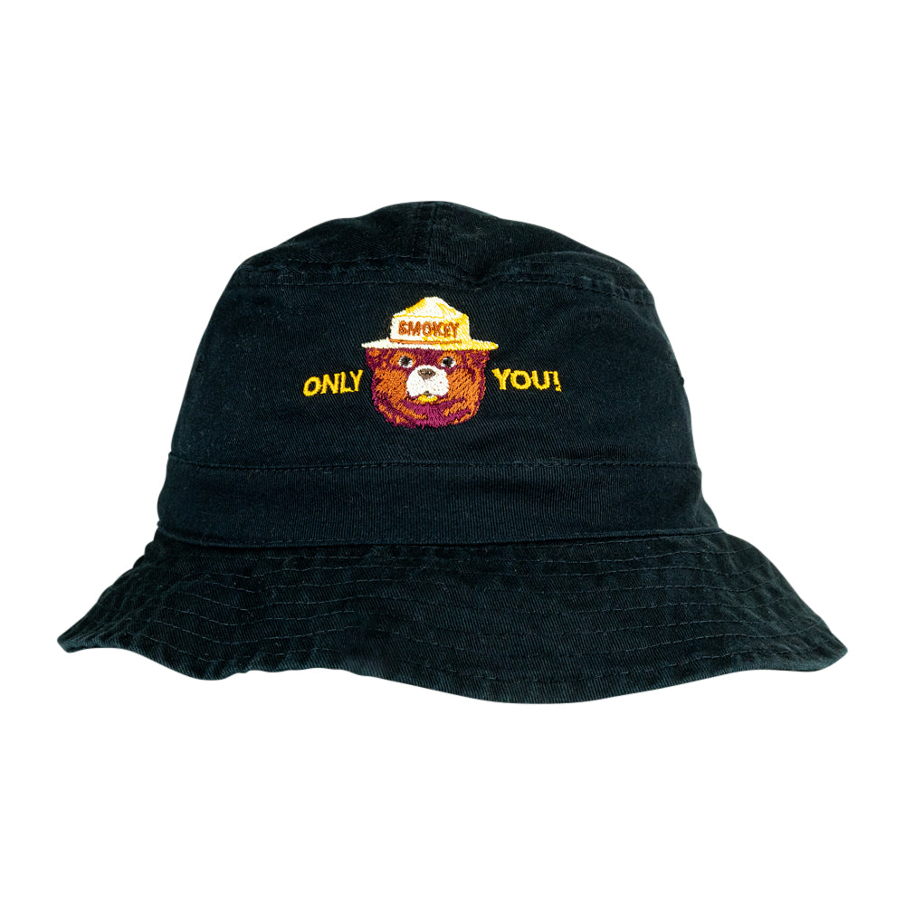 A black bucket hat featuring an embroidered design of a bear wearing a yellow ranger hat with the text &