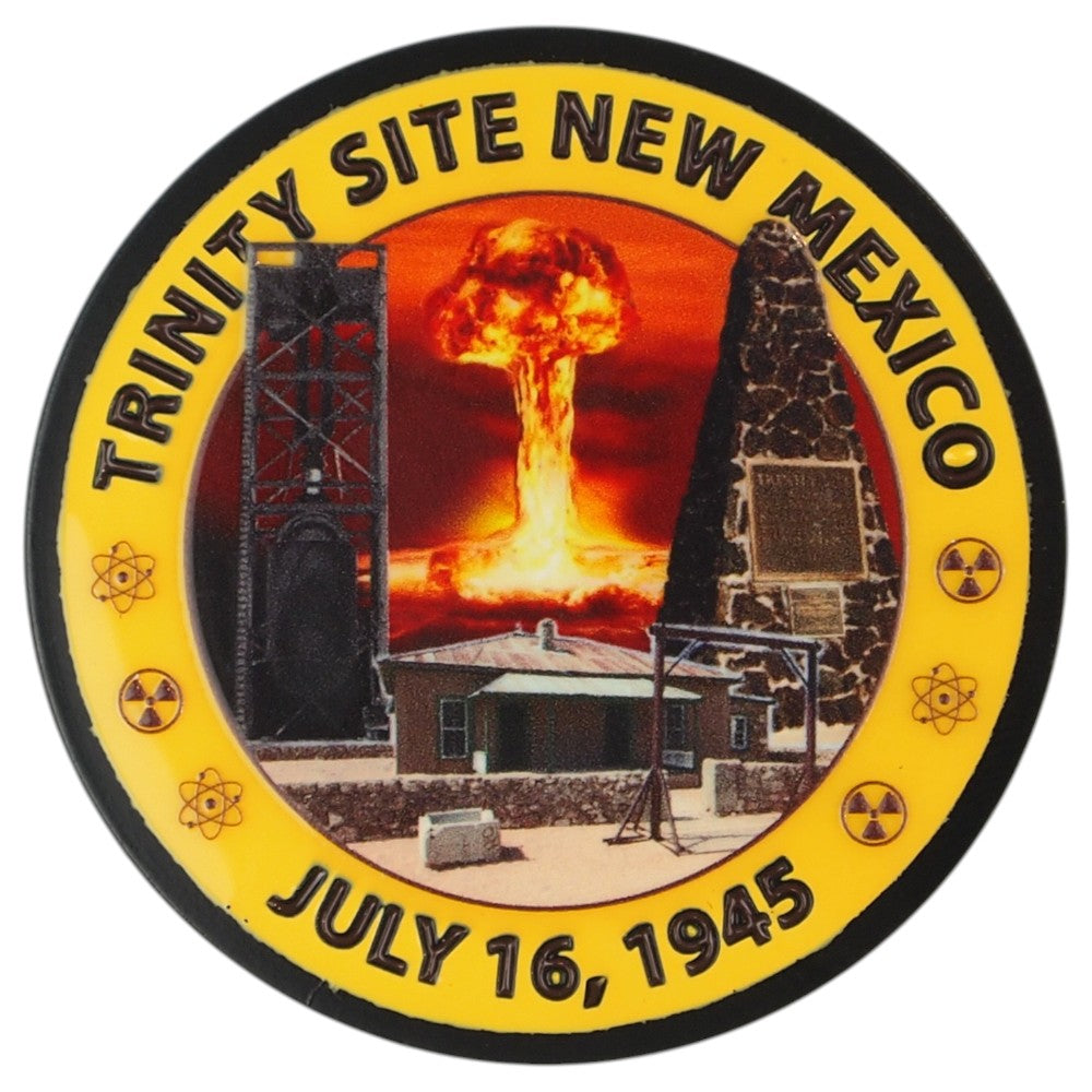 A circular commemorative magnet reading &