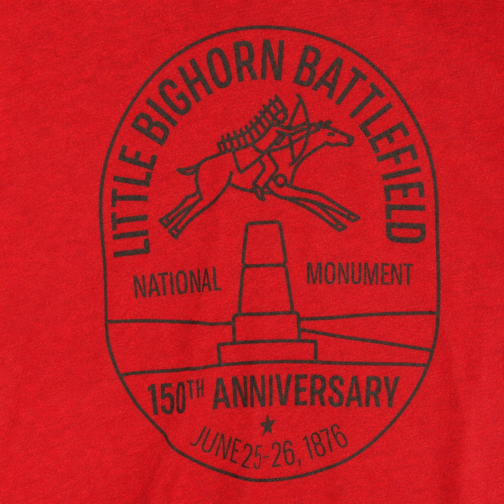 Red t-shirt with black graphic of Little Bighorn Battlefield National Monument on a red background