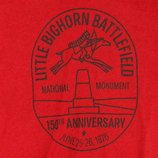 Red t-shirt with black graphic of Little Bighorn Battlefield National Monument on a red background
