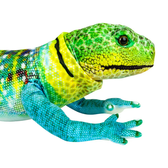 A highly detailed plush model of a colorful gecko lizard, featuring bright green, yellow, and blue scales, with a black stripe around its neck, set against a solid white background.