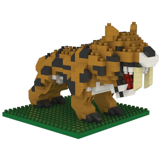 Toy figure of a tiger made from interlocking bricks on a green baseplate.