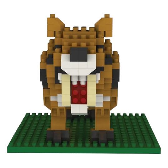 Toy figure of a tiger made from interlocking bricks on a green baseplate.