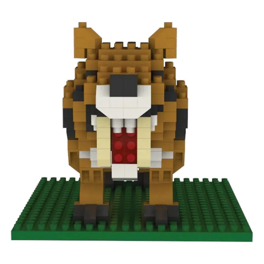 Toy figure of a tiger made from interlocking bricks on a green baseplate.