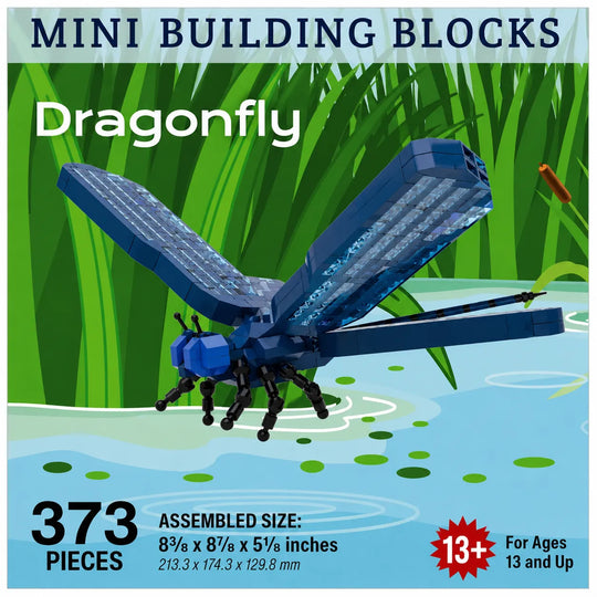 Front packaging artwork for a mini building blocks set featuring a dragonfly. The box art shows a blue and black block-built dragonfly over green reeds and light blue water, with text reading &