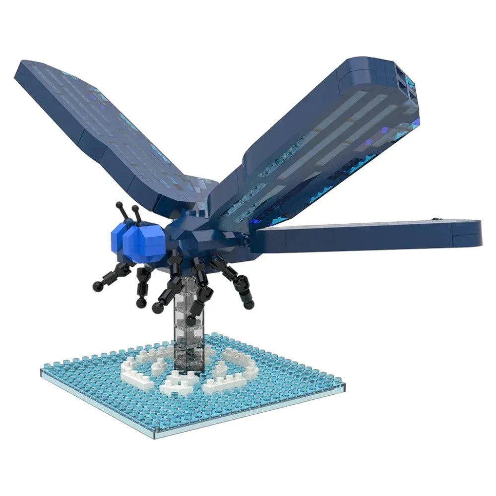 Toy model of a blue insect on a white background