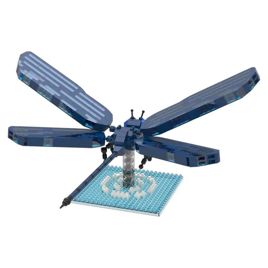 Blue model of a dragonfly made from interlocking bricks on a white background