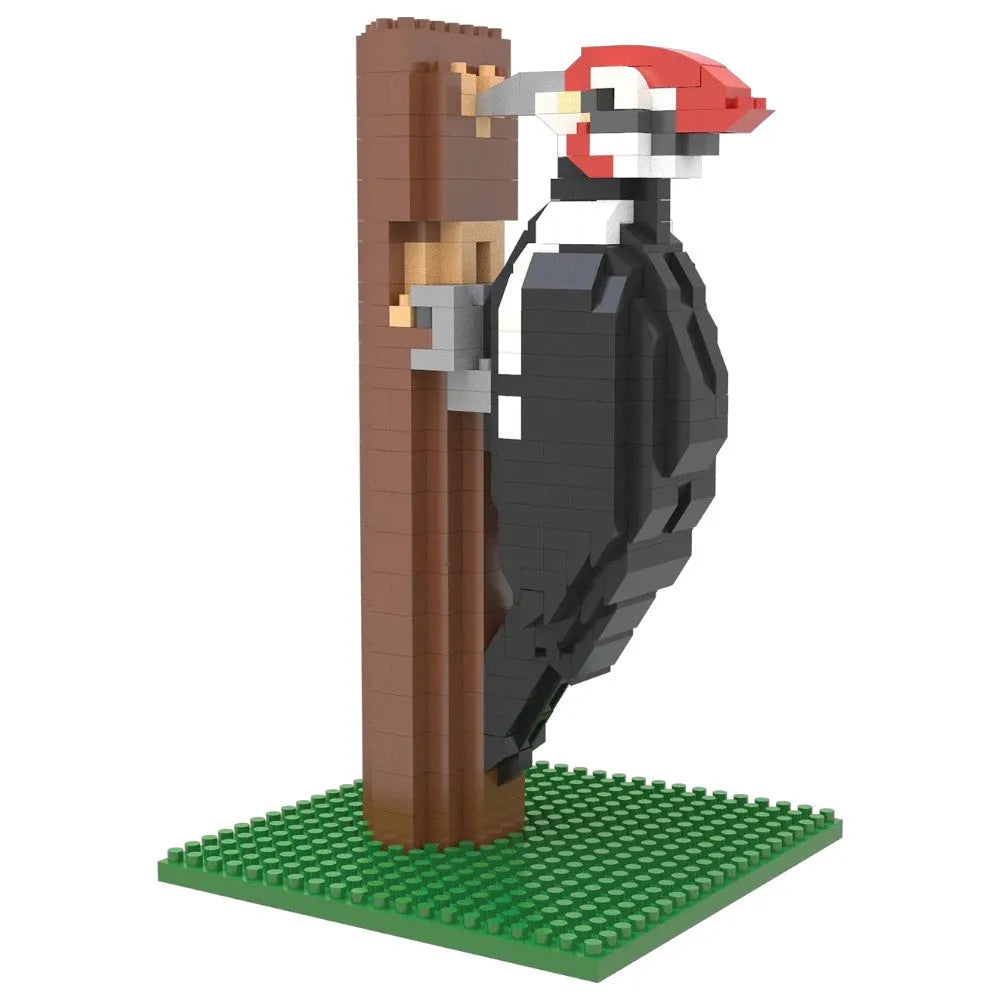 LEGO-style bird perched on a branch with a white background