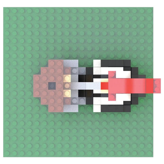 Pixelated image made of interlocking bricks on a green polka dot background