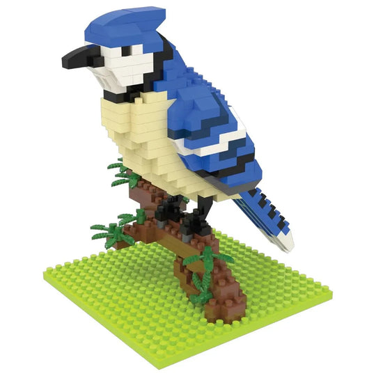 Toy bird made of interlocking bricks on a green baseplate