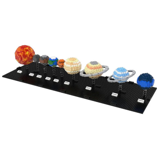 Model of the solar system made from interlocking bricks on a black baseplate.