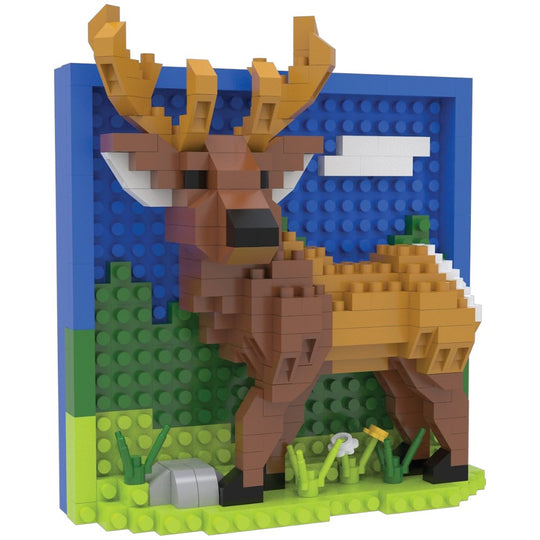 A block-style toy building set depicting a deer standing in front of a blue sky and green hillside, constructed from interlocking bricks on a white background.