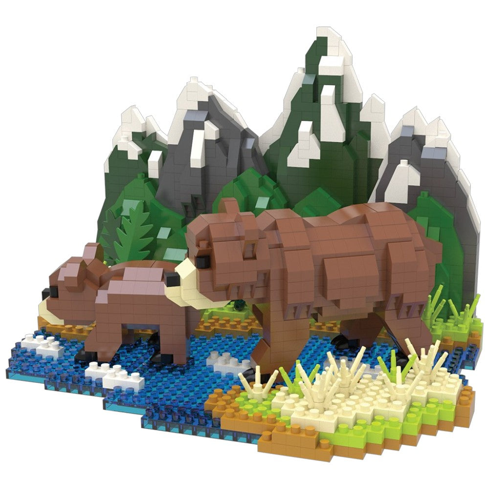 Toy bear and cub set on a landscaped base with mountains and trees.