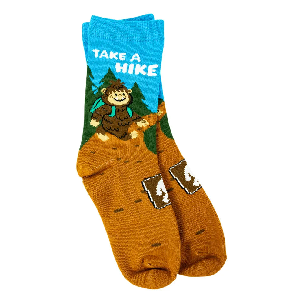 A pair of crew socks with a colorful graphic design. The top half is bright blue with the white text &