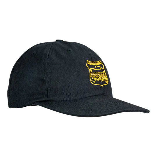 A black baseball cap with a yellow embroidered shield logo on the front, displayed against a solid white background.