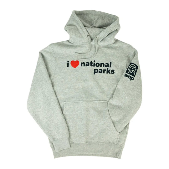A light heather gray pullover hoodie with a front kangaroo pocket and drawstring hood. The chest features the text &