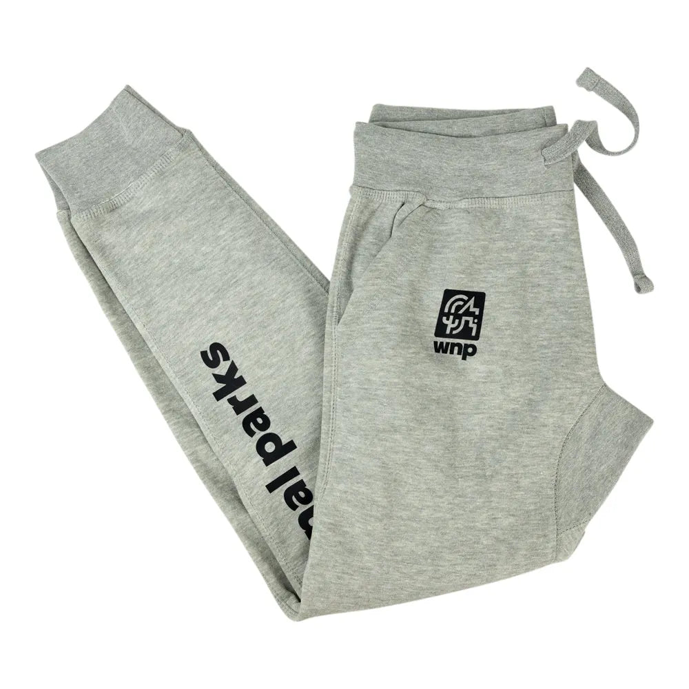 Light heather gray sweatpants folded to show the left leg with black &