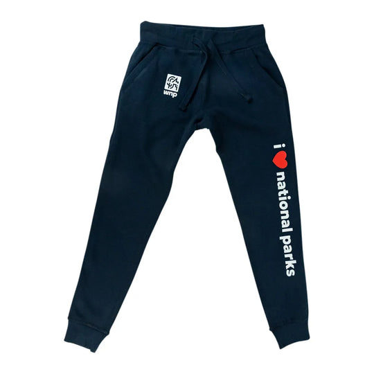 A pair of navy blue sweatpants with a white &
