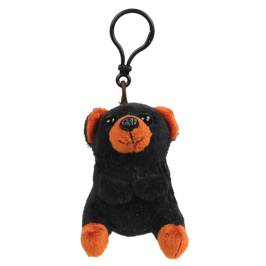 A small plush black bear keychain or bag charm in black and orange, attached to a black metal carabiner clip, shown on a plain white background.