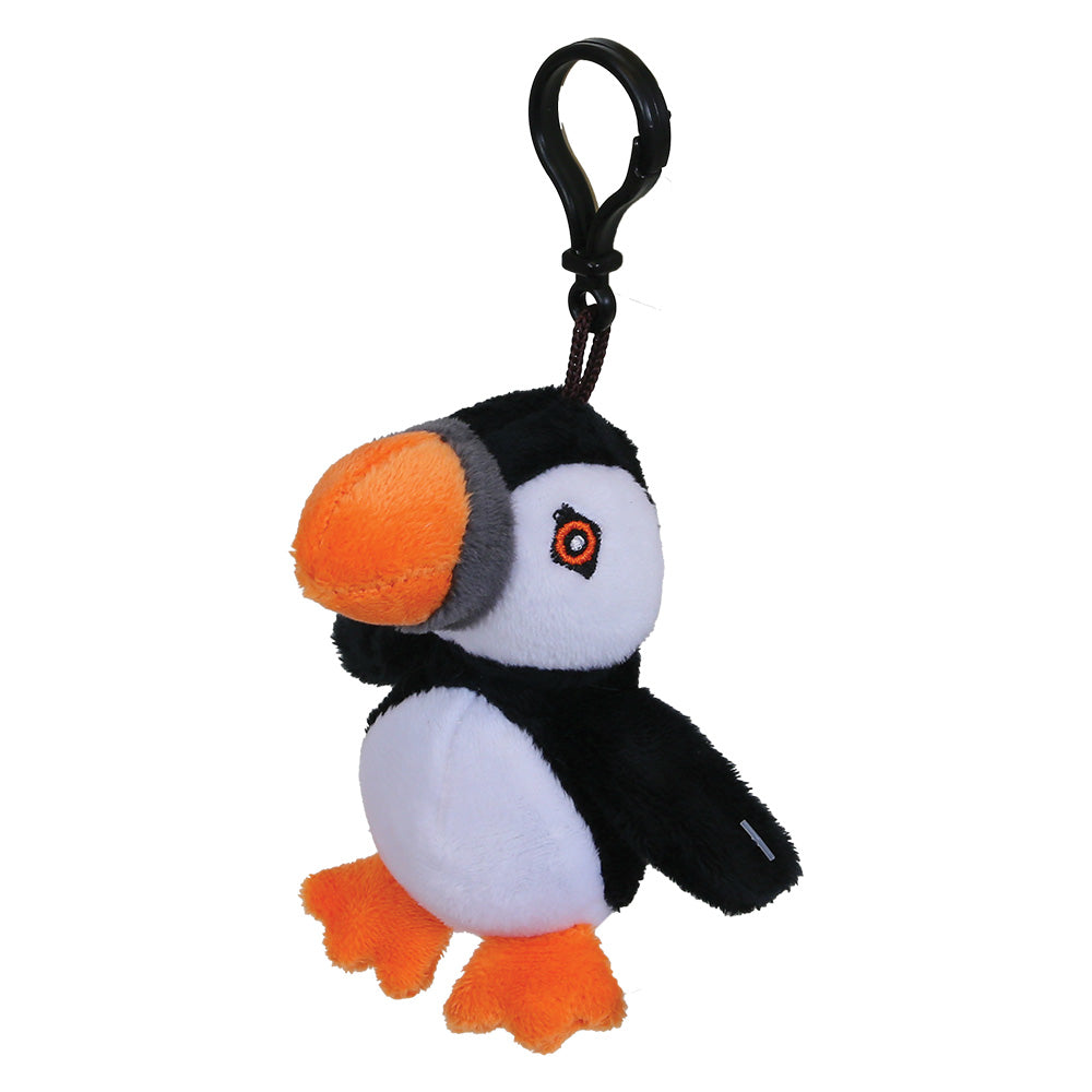 A small plush puffin keychain with a black clip, featuring a white belly, black wings and back, an orange beak, and orange feet, shown on a plain white background.