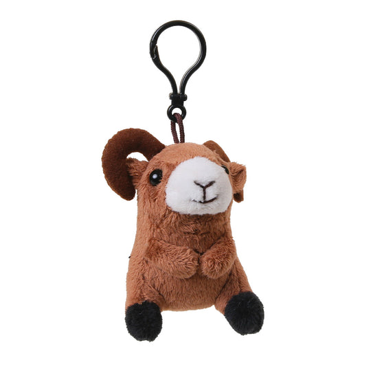 A small plush ram keychain charm with a black metal clip, featuring brown fur, a white snout and face, and black hooves, shown on a plain white background.