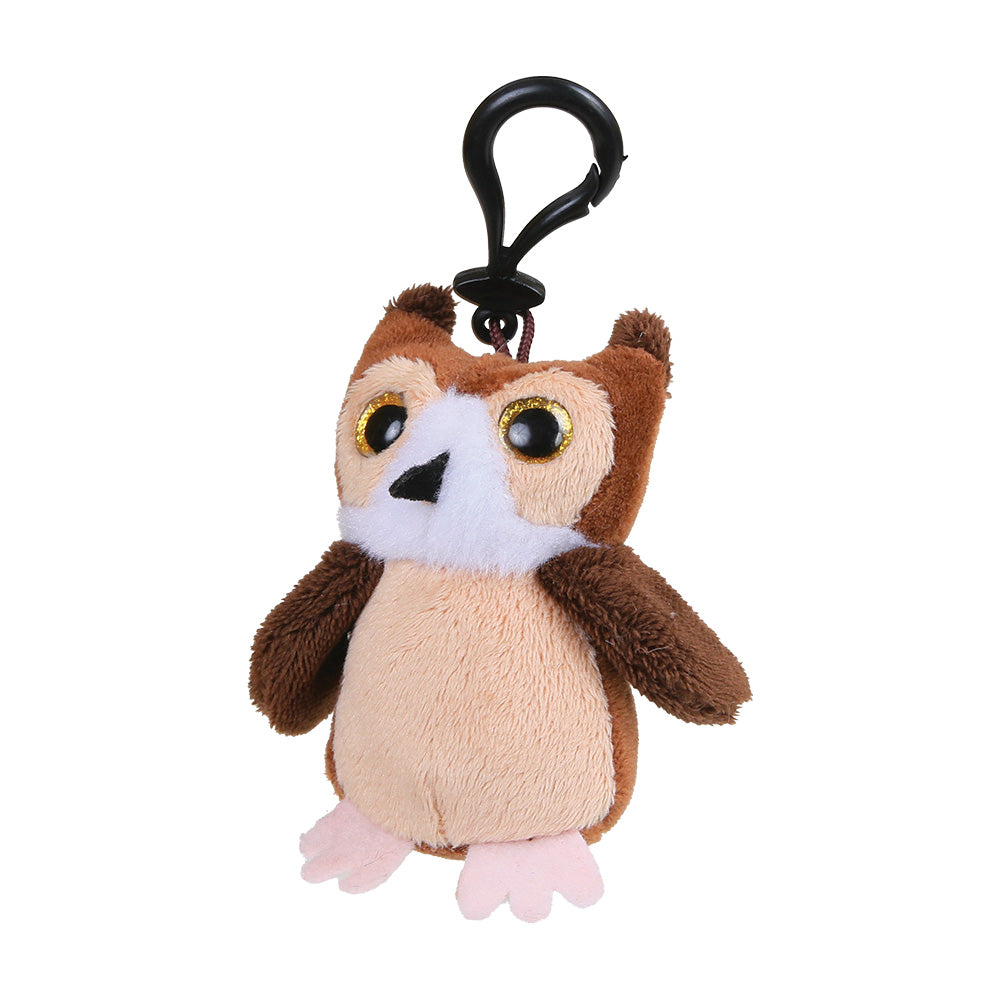 A plush owl keychain with a black metal carabiner clip. The owl features brown and beige plush fabric, a white chest, pink feet, and large yellow-rimmed eyes, shown against a plain white background.