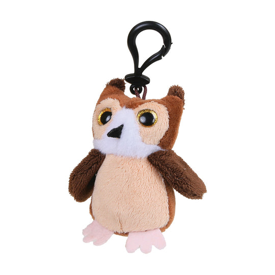 A plush owl keychain with a black metal carabiner clip. The owl features brown and beige plush fabric, a white chest, pink feet, and large yellow-rimmed eyes, shown against a plain white background.