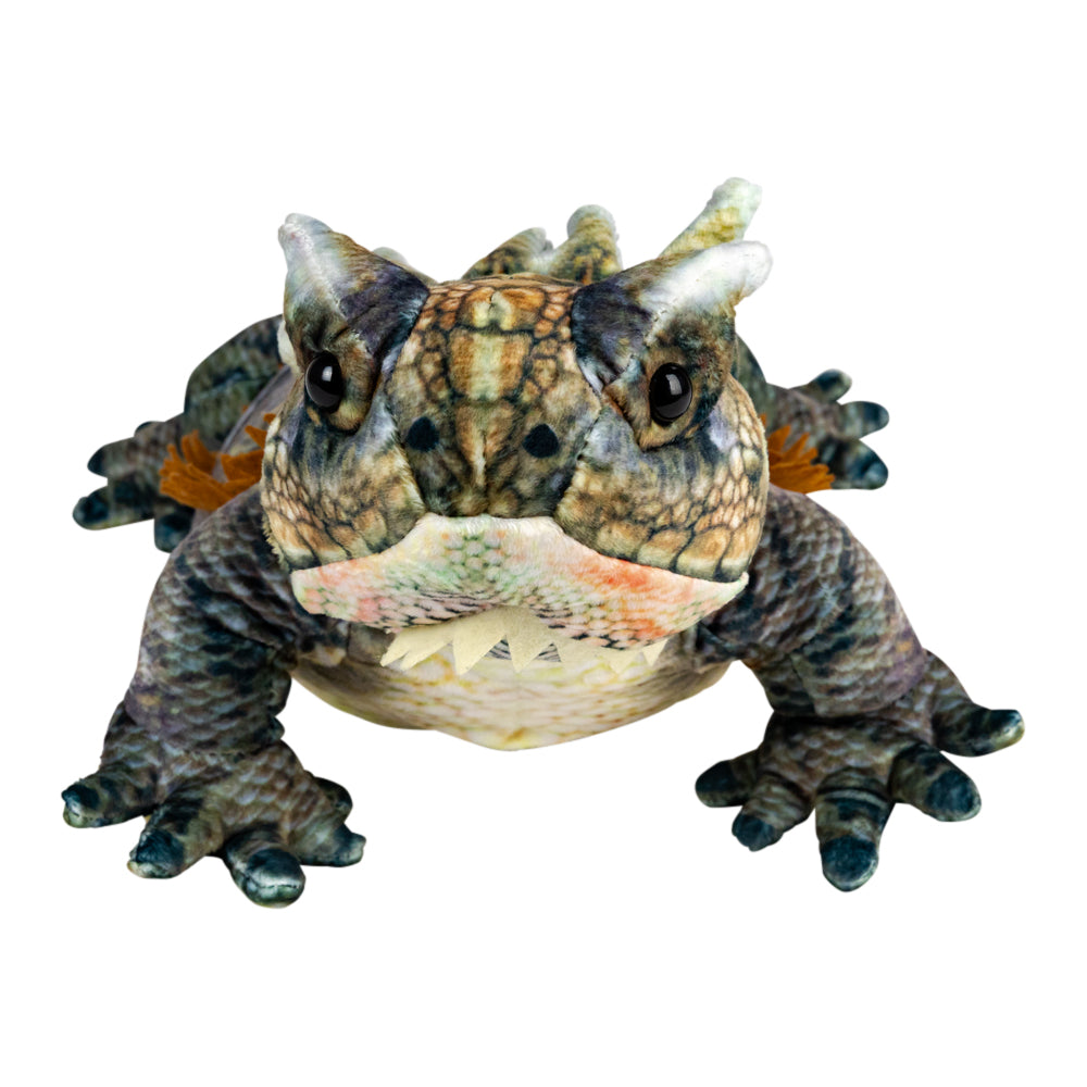 A highly detailed 3D model or toy of a horned lizard reptile, shown against a solid white background.