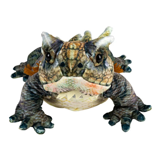 A highly detailed 3D model or toy of a horned lizard reptile, shown against a solid white background.