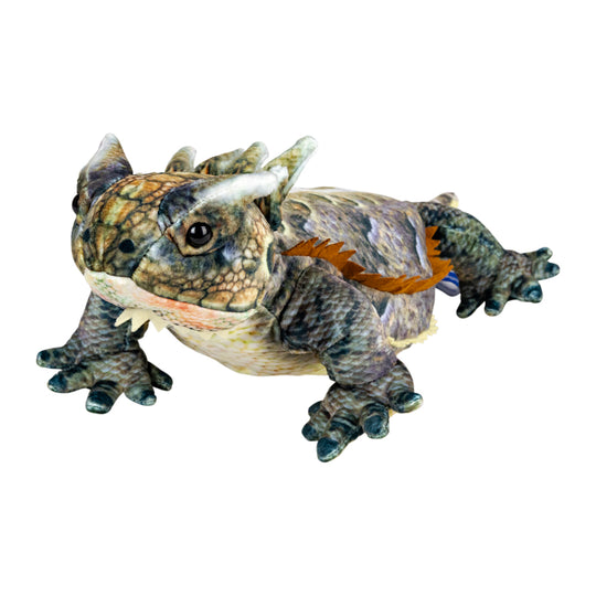 A highly detailed, realistic plush toy of a prehistoric horned lizard, shown against a solid white background.