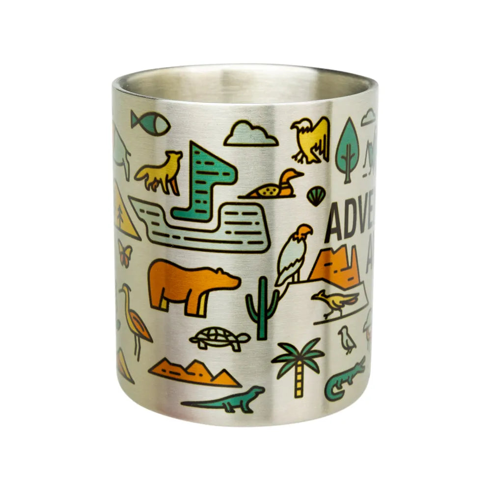 A brushed stainless steel travel tumbler featuring colorful safari-themed illustrations including animals, a boat, mountains, and the partial text &