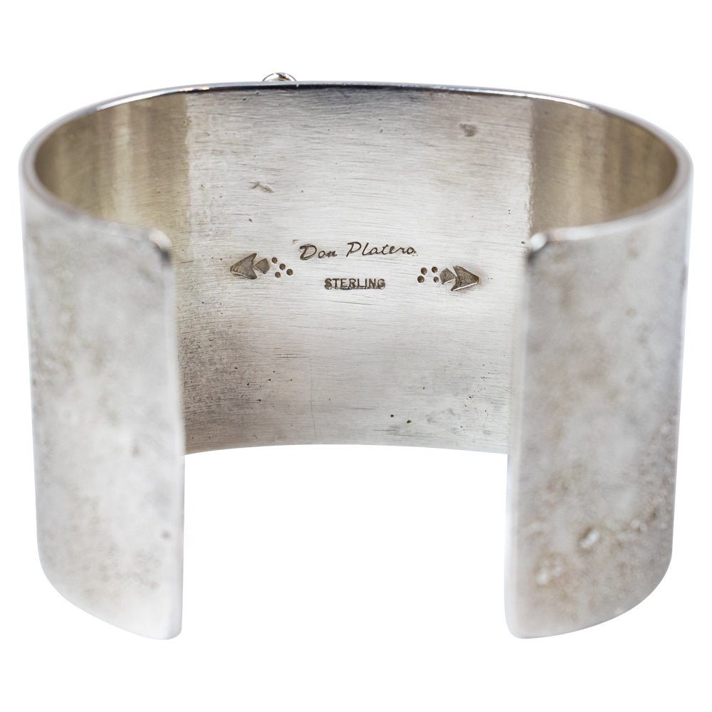 Silver bracelet with 'Don Platero' branding on a white background