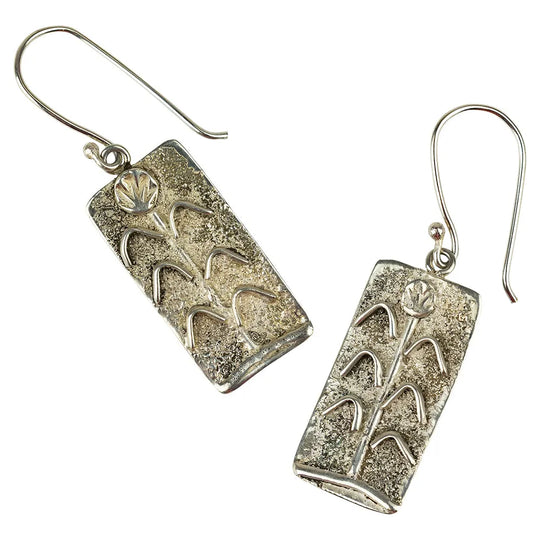 Sandcast Sterling silver dangle earrings on a white background