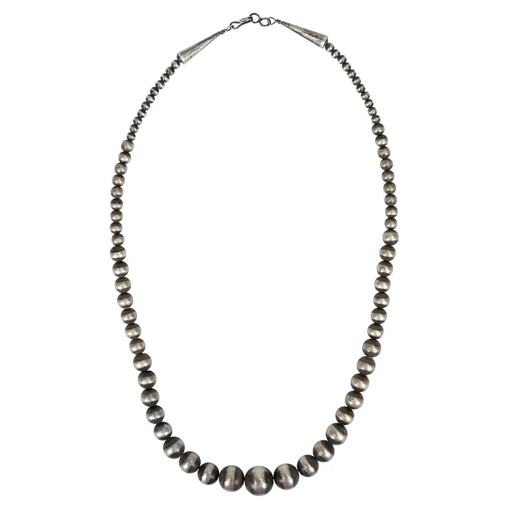 Silver Navajo pearl beads necklace on white background