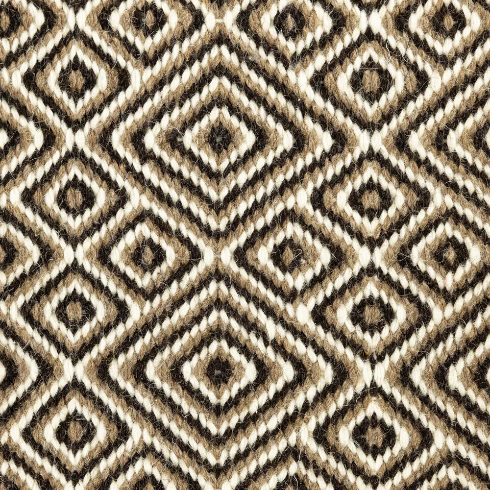 Patterned wool fabric with a geometric design in brown and beige tones.