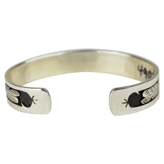 Silver Navajo Storyteller Cuff Bracelet by Gilbert Begay detail and interior on white background