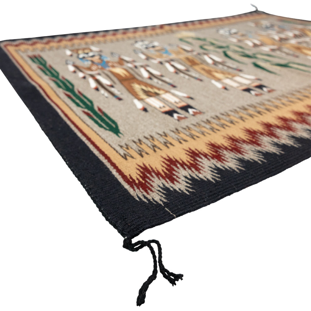 Decorative rug with tribal patterns on a plain background