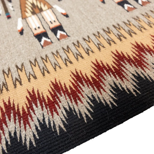 Close-up of a patterned rug with geometric design