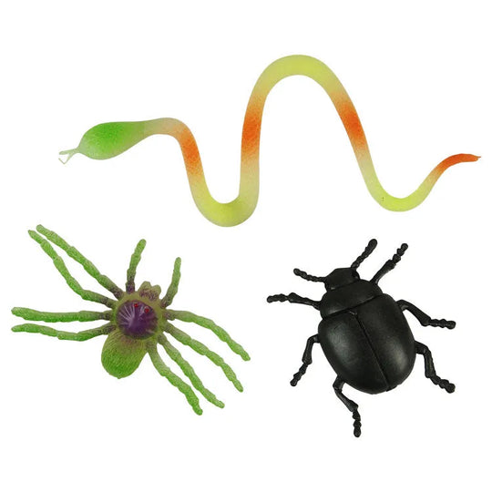 Set of toy insects including a snake, spider, and beetle on a white background